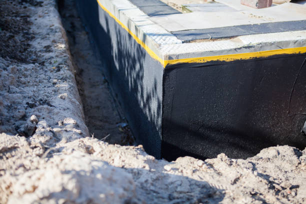 Professional Waterproofing technician working in Westpoint, IN